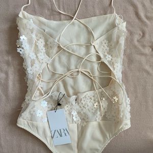 Brand new bodysuit